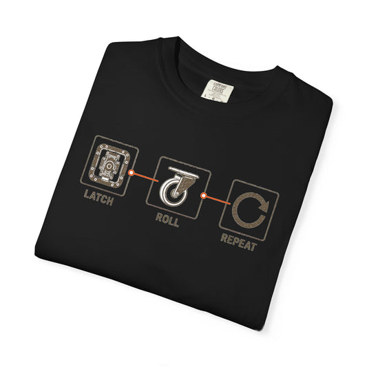 Folded black Latch Roll Repeat T-shirt showing the road-case hardware graphic.