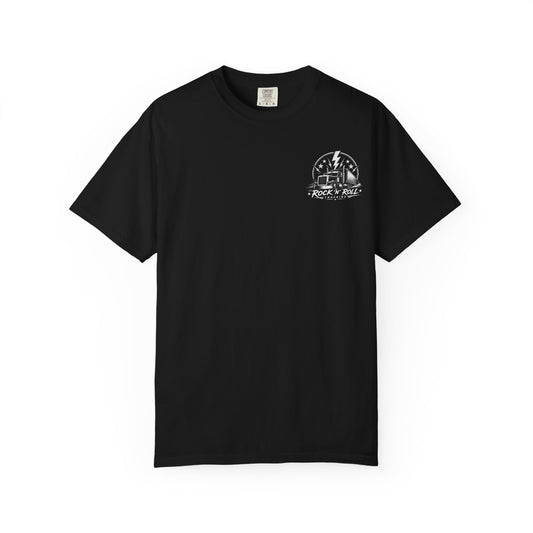 Front of a black Rock N Roll Trucking T-shirt with a small white semi-truck graphic on the left chest.