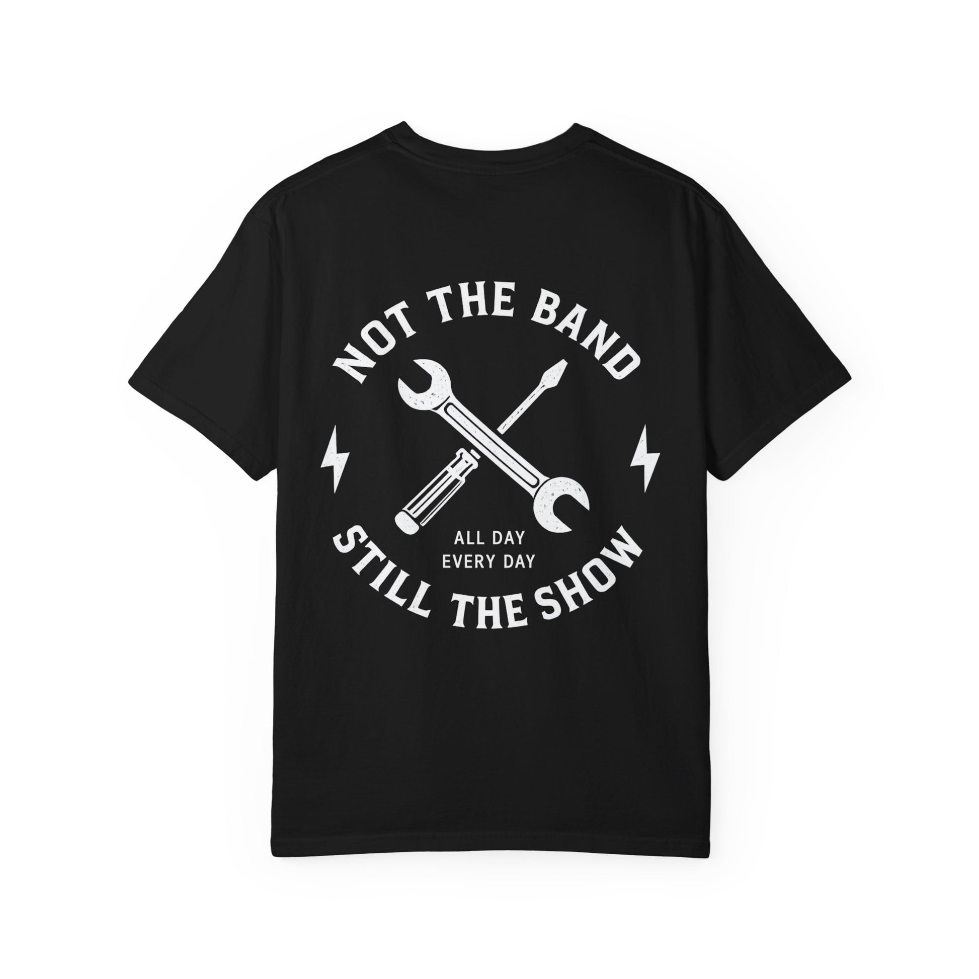Back of a black Still the Show T-shirt with white Not the Band lettering and crossed crew tools.