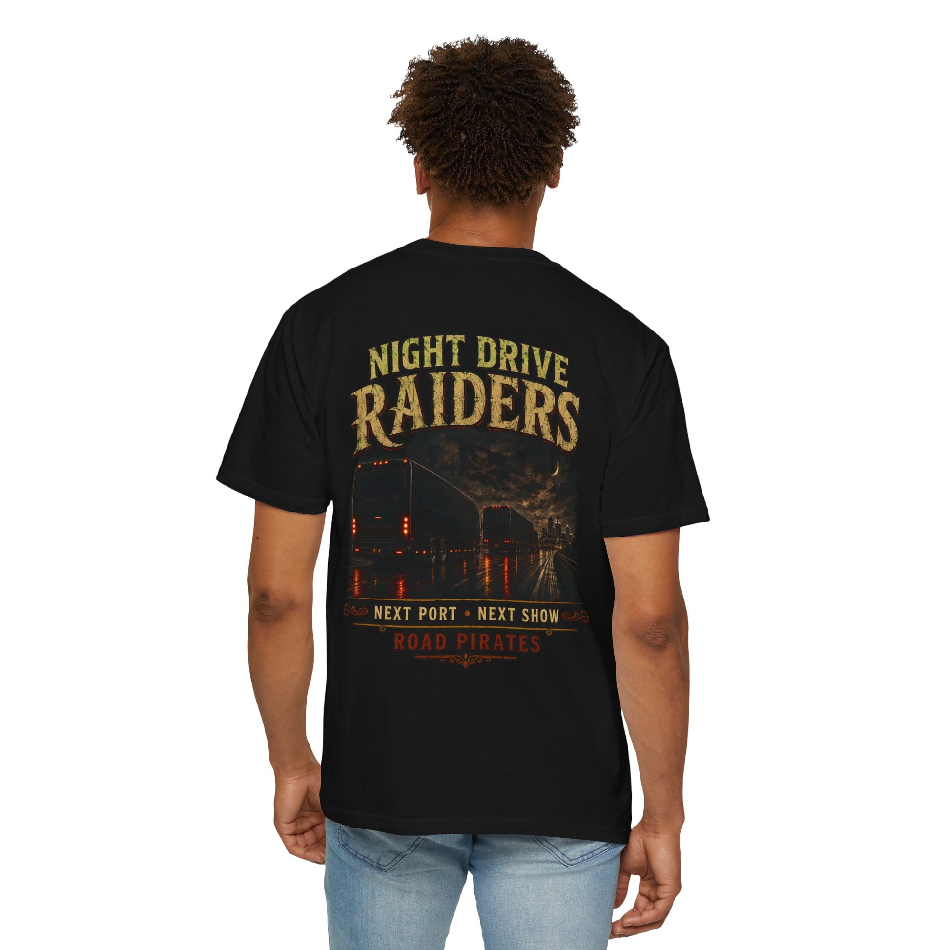 Model wearing the black Night Drive Raiders touring crew T-shirt, showing the large nighttime truck graphic on the back.