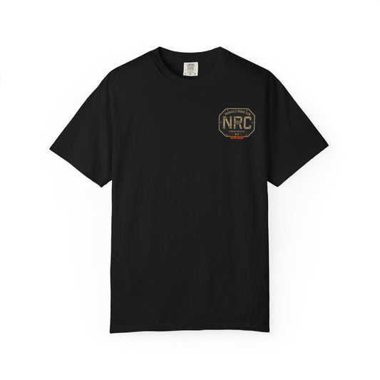 Front of a black Nashville Roadie Club T-shirt with an NRC 615 crew-access badge on the left chest.