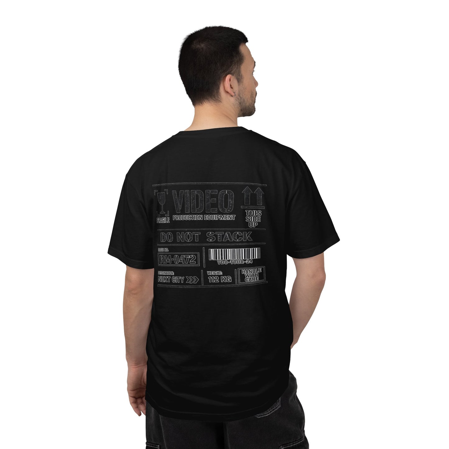 Model wearing the black Video Case video production crew T-shirt from the back.